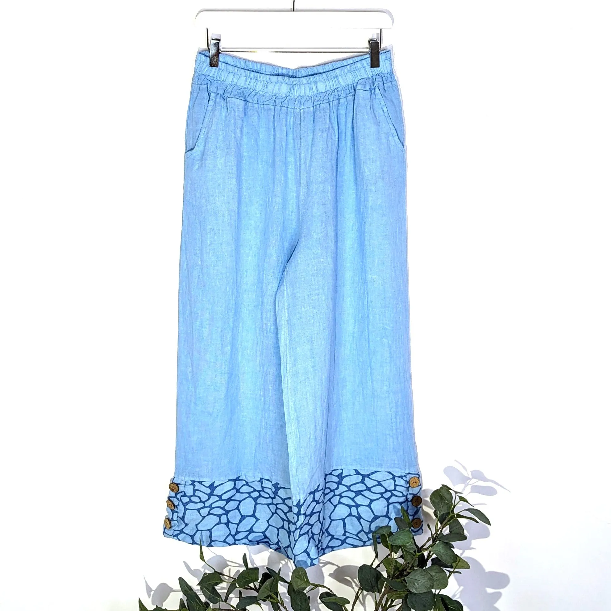 Linen wide leg trousers with coco buttons and giraffe print hem (M-L)