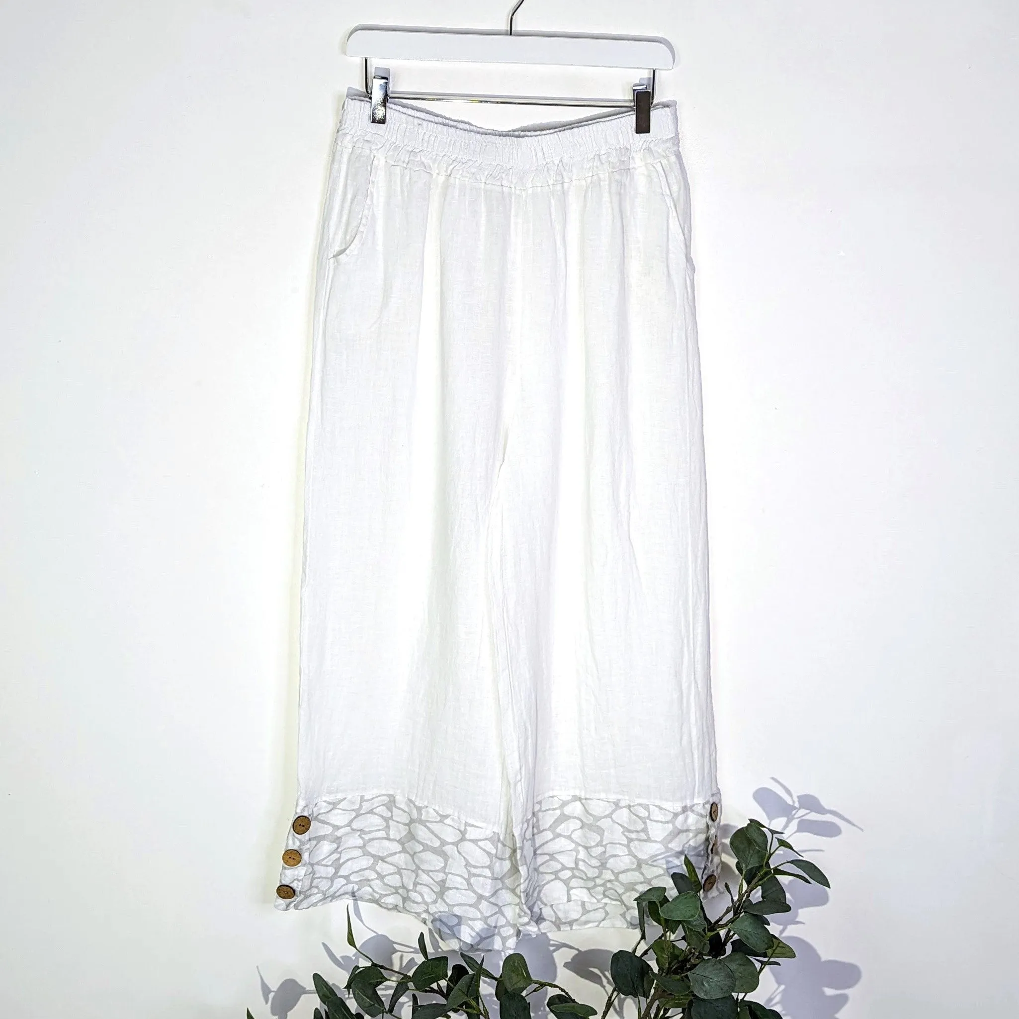 Linen wide leg trousers with coco buttons and giraffe print hem (M-L)