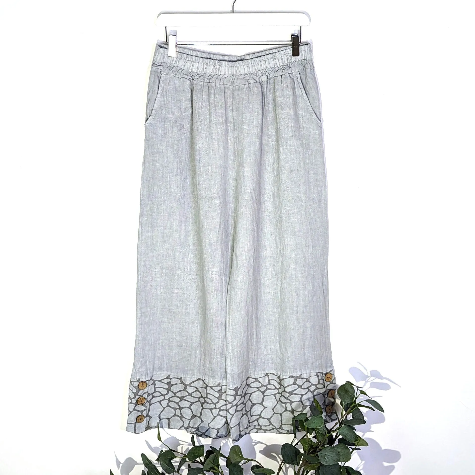 Linen wide leg trousers with coco buttons and giraffe print hem (M-L)