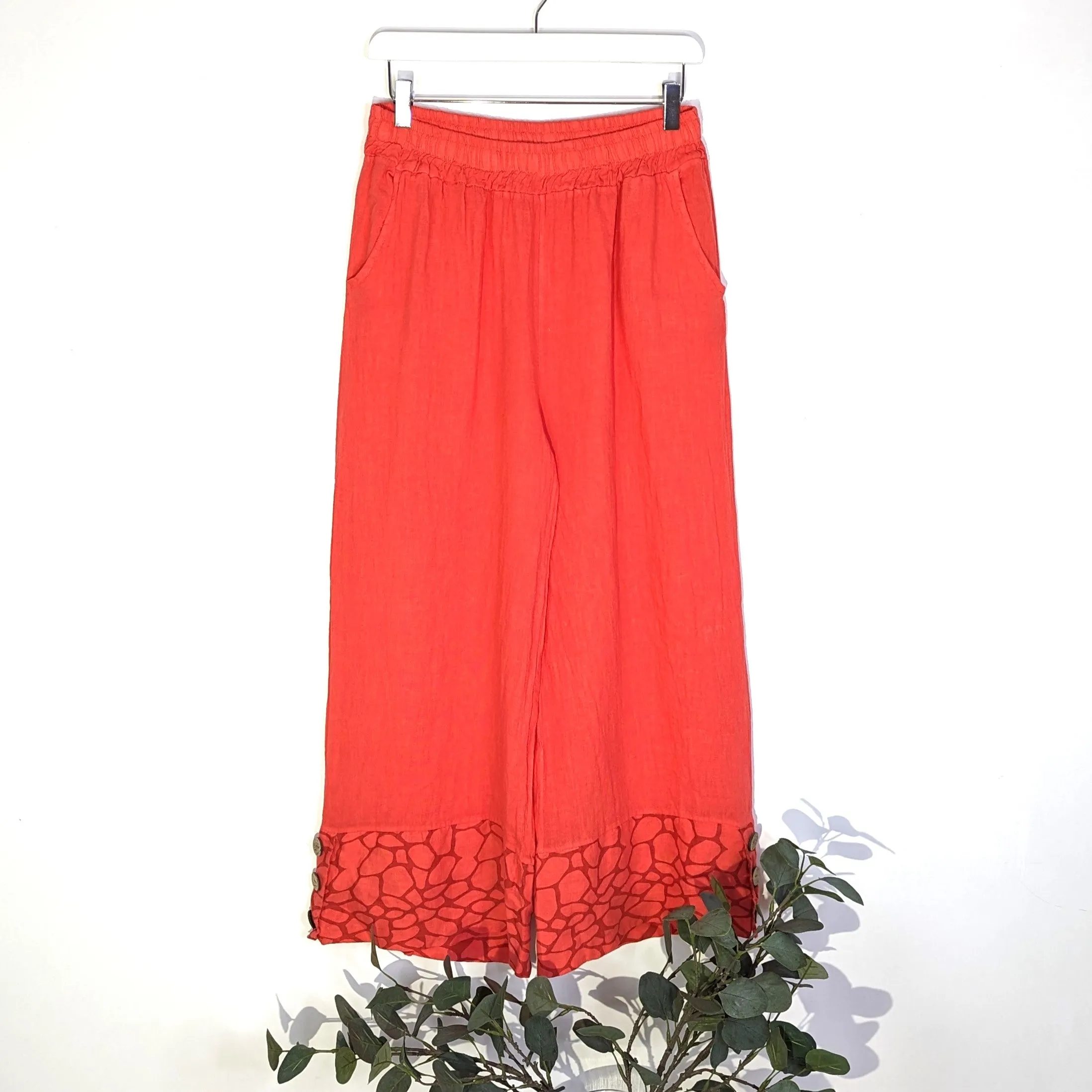 Linen wide leg trousers with coco buttons and giraffe print hem (M-L)